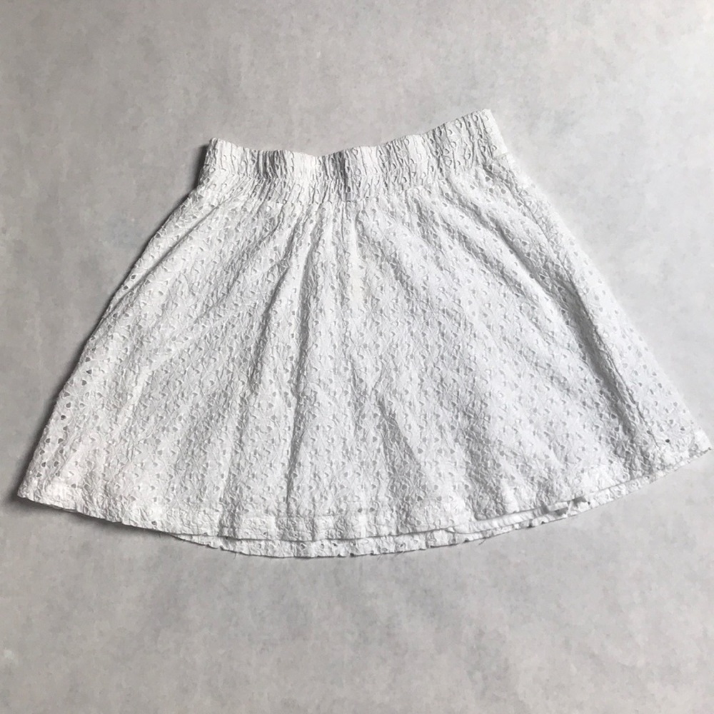 Mossimo eyelet skirt with elastic waist.
